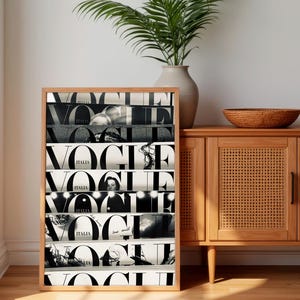 May include: A rectangular framed wall art piece featuring a collage of black and white Vogue Italia magazine covers stacked horizontally. The print displays the bold, iconic Vogue logo repeated across multiple segments, showcasing various photographic details.