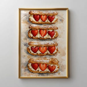 May include: A framed watercolour print showing four eclairs filled with white cream and topped with heart-shaped strawberries. The pastries are dusted with icing sugar, set against a light background, and framed in gold.