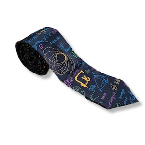 May include: A navy blue tie patterned with colorful mathematical equations and diagrams. The tie displays a repeating pattern of formulas, geometric shapes, and symbols in shades of orange, green, blue, and purple. The tie is rolled up at the top.