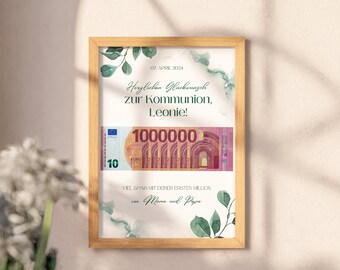 May include: A framed card with a watercolour background and green leaves. The card has a text that says "Herzlichen Glückwunsch zur Kommunion, Leonie!" and a picture of a 10 euro note with the number 1000000 written on it. The text at the bottom says "Viel Spaß mit deiner ersten Million von Mama und Papa."