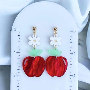 Charming red apple earrings, daisy accents, ideal gift for teachers, summer earrings, playful design, lightweight, acrylic, stainless steel, 2.30" x 2.10" x 0.95"