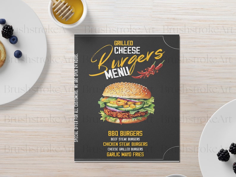 Op de afbeelding: Een zwart-wit menu voor een restaurant genaamd "Grilled Cheese Burgers". Het menu bevat een grote illustratie van een cheeseburger met sla, tomaat en augurk. Het menu bevat de volgende items: BBQ Burgers, Beef Steak Burgers, Chicken Steak Burgers, Cheese Grilled Burgers en Garlic Mayo Fries.