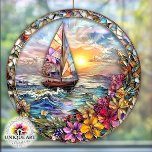 May include: A stained glass suncatcher featuring a sailboat sailing on a blue ocean with a sunset in the background. The suncatcher is surrounded by colorful flowers.
