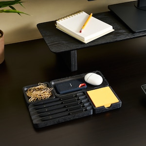 the essentials desk organization set in black oak. This set is used to help declutter your workspace and bring order to your desk