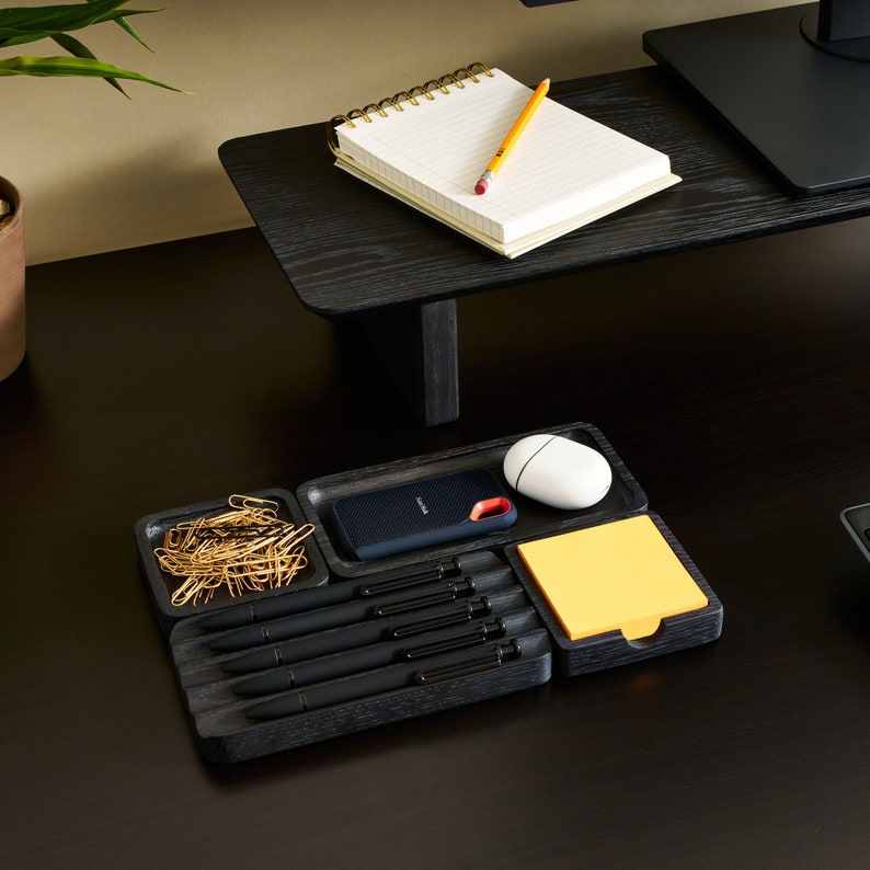 the essentials desk organization set in black oak. This set is used to help declutter your workspace and bring order to your desk