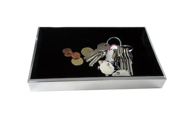 Empty pockets, object holder in polished 925 silver