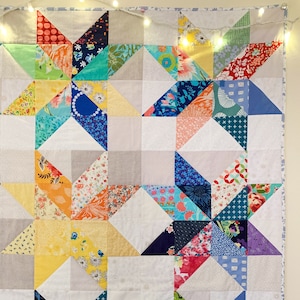 PDF Scrappy Stars Throw Quilt Pattern Download, scrap quilt, beginner quilt pattern, charm pack quilt pattern, half square triangle quilt