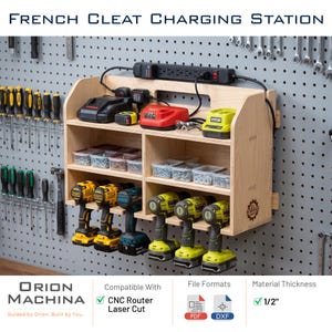 May include: A wooden French cleat charging station with multiple shelves, holding power tools, chargers, and small storage containers. The text "FRENCH CLEAT CHARGING STATION" is at the top. The station is mounted on a pegboard wall.