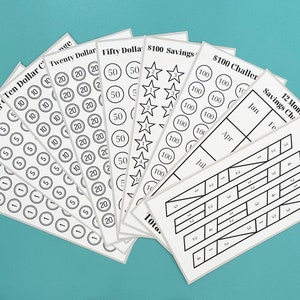 Könnte beinhalten: Ein Satz druckbarer Spartabellen und -tracker für eine 12-monatige Sparherausforderung von 75 €. Die Tabellen beinhalten eine 100 € Sparherausforderung, 100 € Sparen, 50 €, 20 €, 10 €, 5 € und 1 € Tracker.