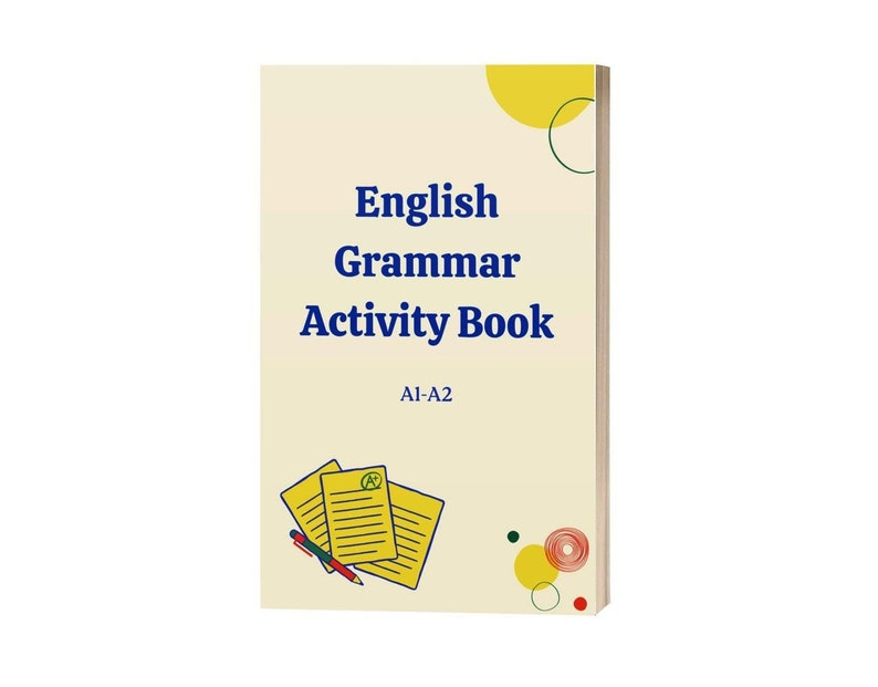 May include: A cream-colored English Grammar Activity Book with the title in blue. The book cover features the text "English Grammar Activity Book" and "A1-A2". Illustrations of papers and a pen are at the bottom.