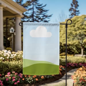 May include: A blue and green garden flag with a white cloud and green hills. The flag is attached to a black metal pole.