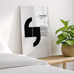 May include: A black and white minimalist poster with a quote about good design. The quote reads "Good design is as little design as possible." The poster is framed in a white frame and is hanging on a white wall.