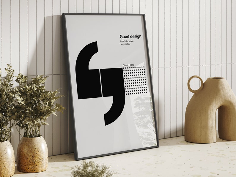 May include: A black and white poster with a quote by Dieter Rams that reads "Good design is as little design as possible."