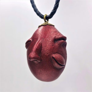 Red Devil Bronze Premium Surrealist Egg Pendant