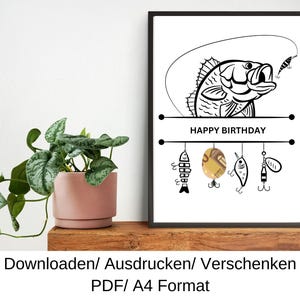 Puede incluir: Una tarjeta de cumpleaños imprimible con una ilustración en blanco y negro de un pez con un señuelo de pesca. La tarjeta dice "Feliz cumpleaños" y tiene un espacio para una tarjeta de regalo o dinero.