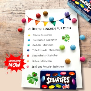 Könnte beinhalten: Eine weiße Karte mit deutschem Text und bunten Süßigkeiten. Die Karte listet verschiedene Arten von "Steinchen" oder Steinen auf, und eine Schachtel Smarties Mini ist sichtbar. Eine rote "DOWNLOAD NOW" Grafik befindet sich in der Ecke.
