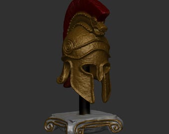 May include: A gold Greek warrior helmet with a red plume, displayed on a white marble stand with gold accents.
