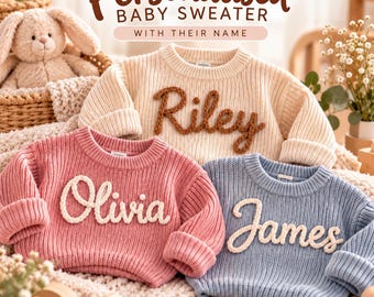 May include: Three knitted baby sweaters in cream, pink, and blue, each featuring a name embroidered in a contrasting yarn. The cream sweater displays the name Riley, the pink sweater says Olivia, and the blue sweater says James.