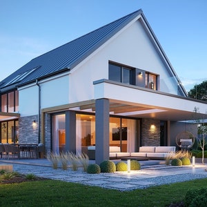 Può includere: Una casa moderna di colore bianco con un tetto in metallo grigio e un ampio patio coperto. Il patio ha un pavimento in pietra ed è arredato con un divano, sedie e una sedia a dondolo. La casa è circondata da un lussureggiante prato verde e alberi.