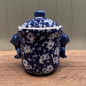 Chinese handpainted Prunus decor lidded jar - Special design with handles looking like bears.
