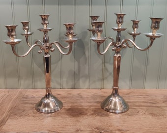 Pair of vintage Chromed candle holders for 5 candles - 40 centimeters tall.