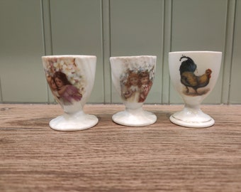 3 Egg cups with different designs