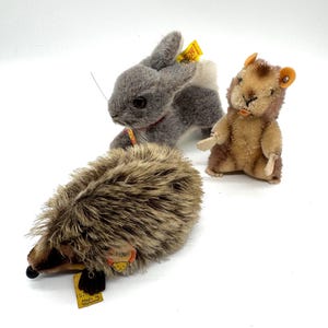 Vintage Steiff Set of 3 Plush Animals – Joggi Hedgehog (1670/10), Hoppy Rabbit (1501/13), and Hammy Hamster (1110/00)