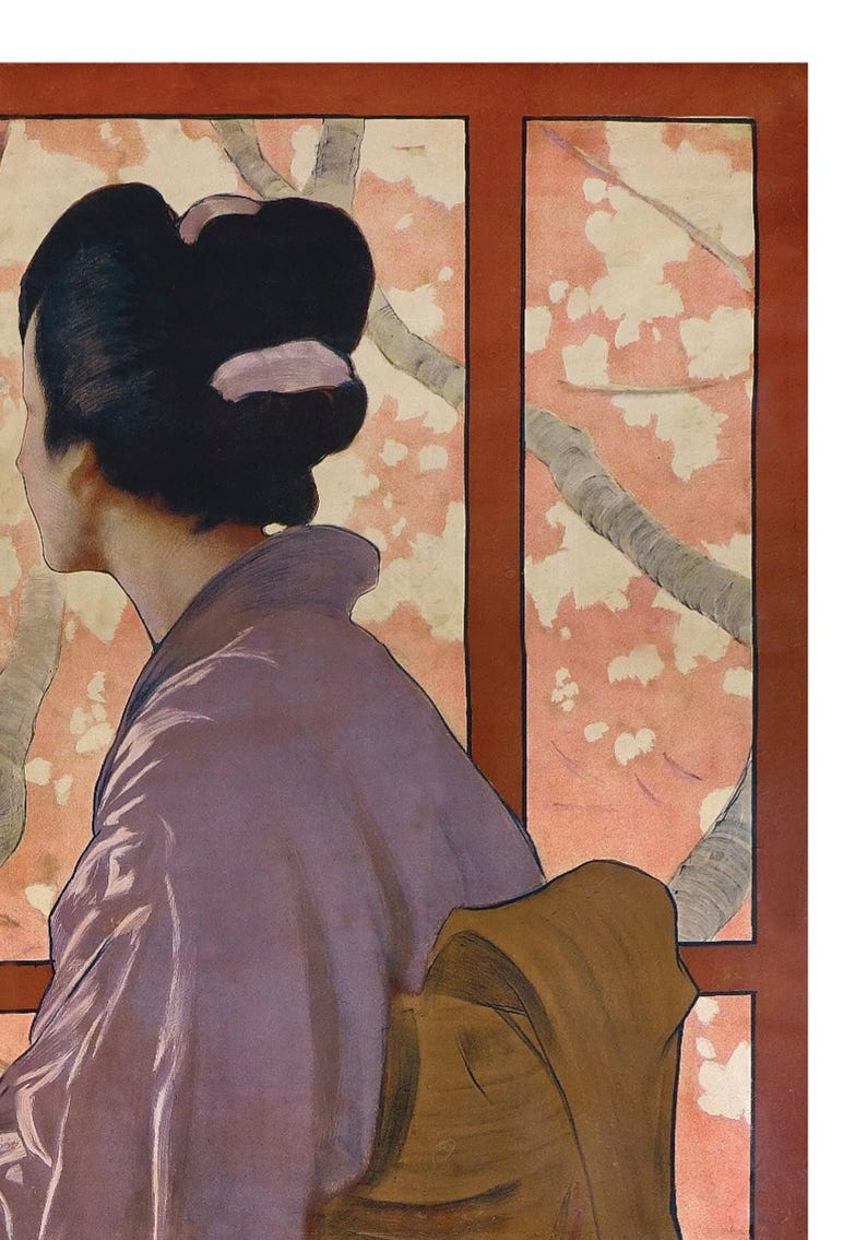 May include: A woman in a purple and brown kimono sits in front of a window with a pink and white floral pattern. The woman's hair is styled in a bun with a pink ribbon.