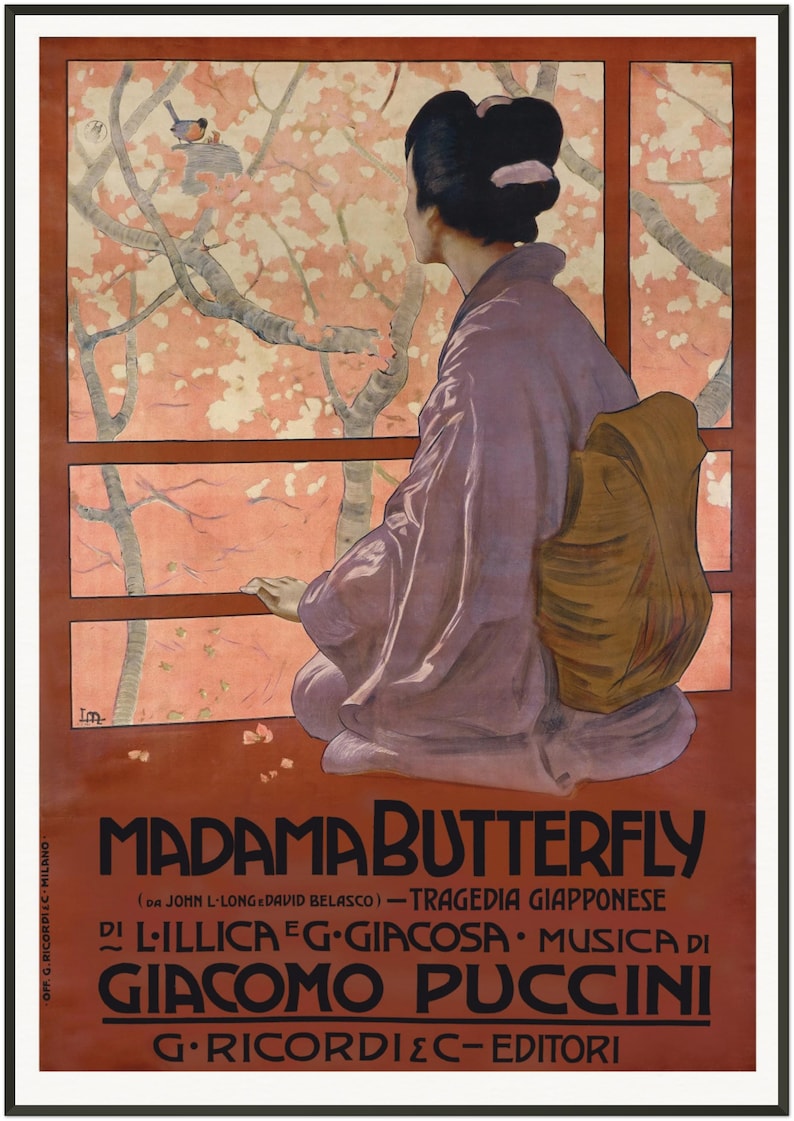 May include: A vintage poster for the opera "Madama Butterfly" by Giacomo Puccini. The poster features a woman in a traditional Japanese kimono looking out a window at a blossoming cherry tree. The text on the poster reads "Madama Butterfly (da John L-Long e David Belasco) - Tragedia Giapponese di Lilica e G. Giacosa. Musica di Giacomo Puccini. G. Ricordi & C. Editori."