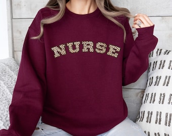 Leopard Print Krankenschwester Sweatshirt im College Style Rundhalsausschnitt
