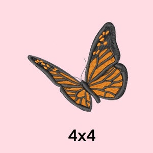 May include: A black and orange butterfly embroidery design with the text "4x4" below it.