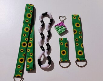 hidden disability sunflower lanyard and wristlets