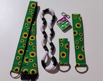 hidden disability sunflower wristlets and lanyards on a D ring