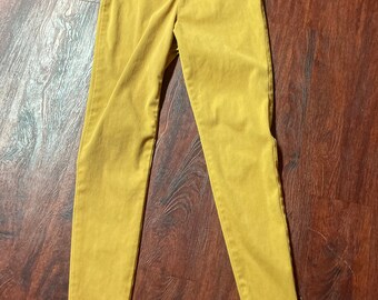 Small yellow skinny jeans