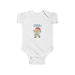 May include: White baby bodysuit with the word "OPA!" in blue letters. A cartoon illustration of a dancing child in traditional Greek attire is below the text. The child is wearing a red hat, white skirt, and brown shoes.