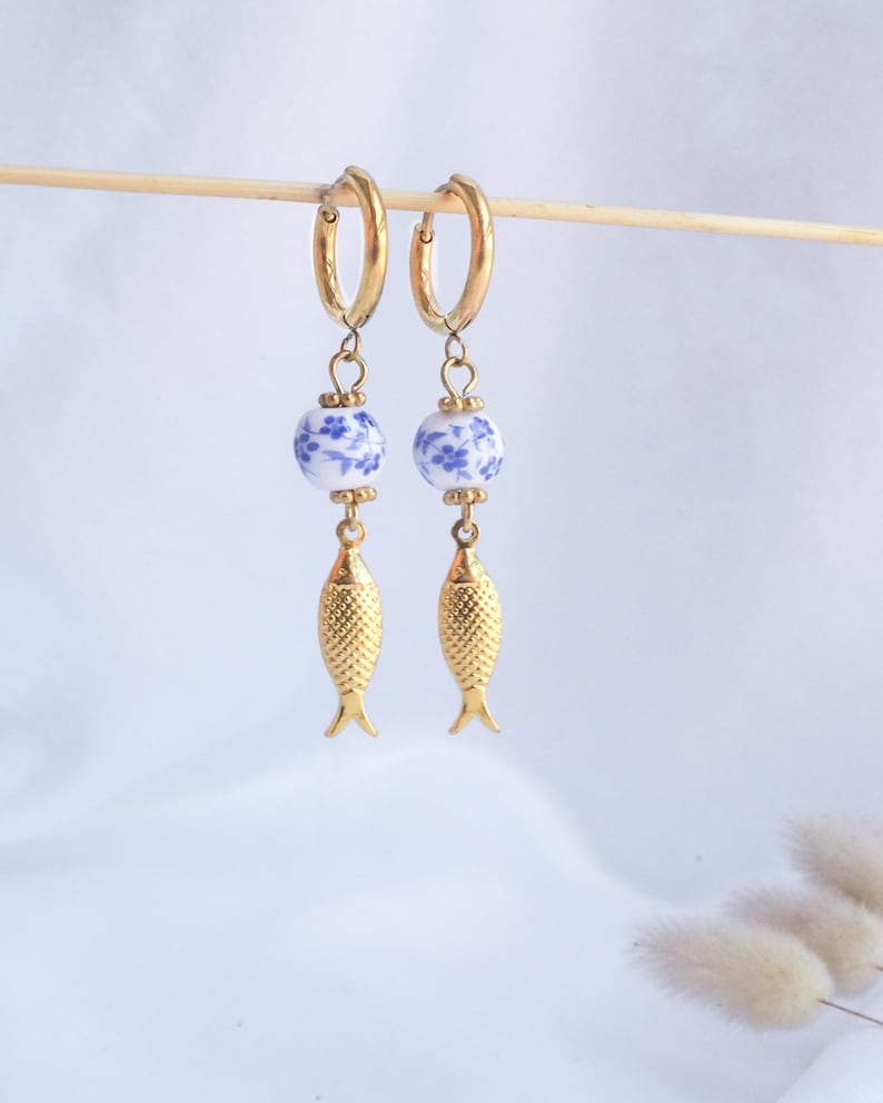 front view of Gold Sardine Earrings with Ceramic Tile from Portugal on display - Coastal Jewelry from Portugal, seabylou, Sea by Lou, Fish earrings