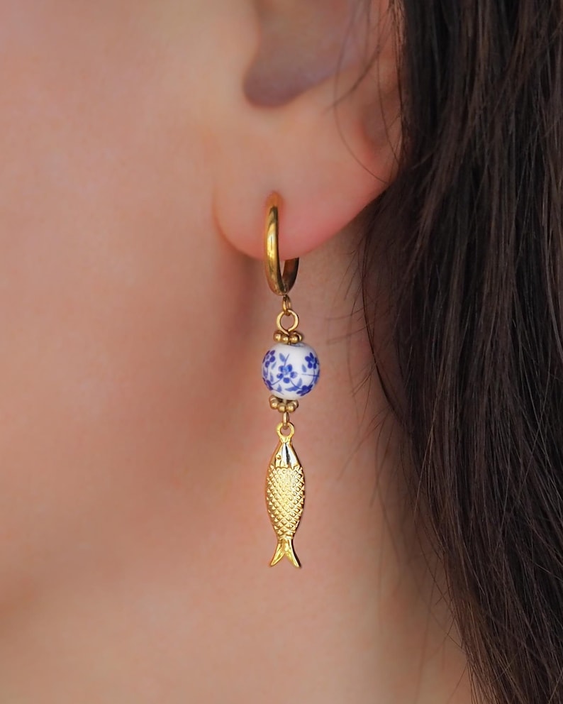 Gold Sardine Earrings with Ceramic Tile from Portugal in ear model - Coastal Jewelry from Portugal, seabylou, Sea by Lou, Fish earrings