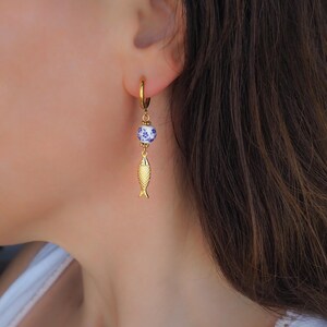 Model wearing Gold Sardine Earrings with Ceramic Tile from Portugal - Coastal Jewelry from Portugal, seabylou, Sea by Lou, Fish earrings