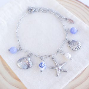 Charm Bracelet with Silver Starfish, Shell pendants, Azulejo Tile ceramic beads, gemstones. Ocean inspired jewelry from Portugal