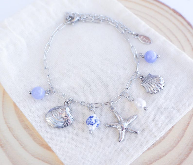 Charm Bracelet with Silver Starfish, Shell pendants, Azulejo Tile ceramic beads, gemstones. Ocean inspired jewelry from Portugal
