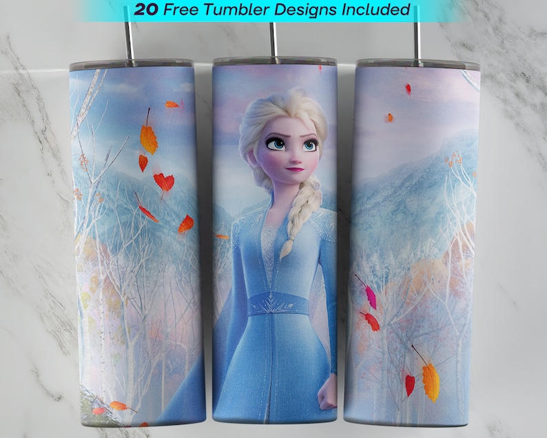 May include: A set of three stainless steel tumblers with a design featuring Elsa from the movie Frozen. The tumblers have a blue and white background with a snowy forest scene and falling leaves. The design includes Elsa in her blue dress and blonde hair.