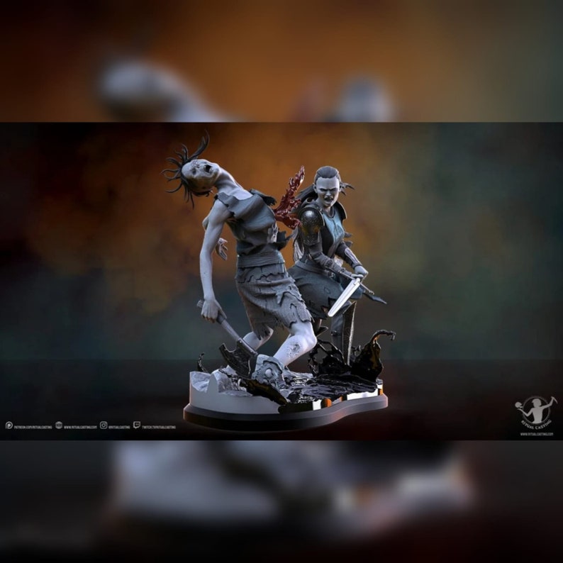 May include: A gray painted figurine of two figures, one with a sword and the other with a knife, standing on a black base. The figure with the sword has a red and black design on its chest.