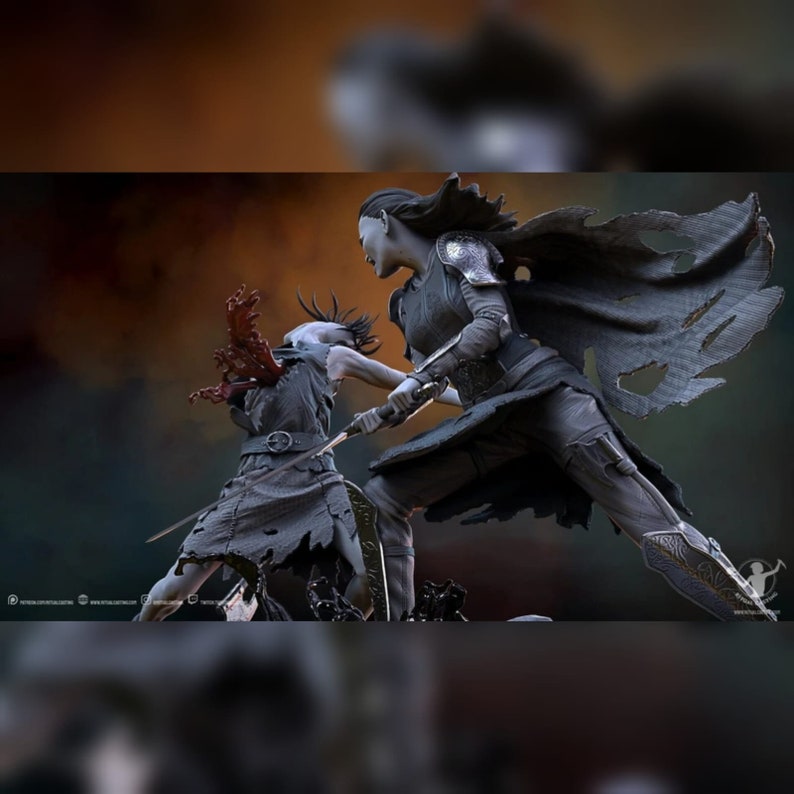 May include: Two fantasy figures in a dramatic pose, one with a sword and the other with a cloak, appear to be fighting. The figures are sculpted in a gray color and have detailed features.