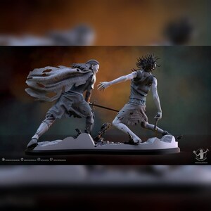 May include: A gray painted figurine of two figures in a fighting pose. One figure is wearing a cloak and holding a sword, while the other figure is holding a dagger. The figures are standing on a gray base.