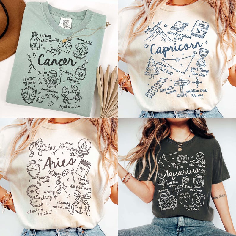 May include: Four t-shirts with zodiac-themed designs. The shirts are light green, cream, cream, and dark green. Each shirt features a different zodiac sign, including Cancer, Capricorn, Aries, and Aquarius, with related illustrations and text.
