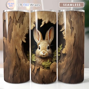 May include: A brown and tan tumbler with a seamless design of a rabbit peeking out of a tree trunk. The tumbler has a white lid and straw. The text "+9 FREE Wraps" is visible on the image.