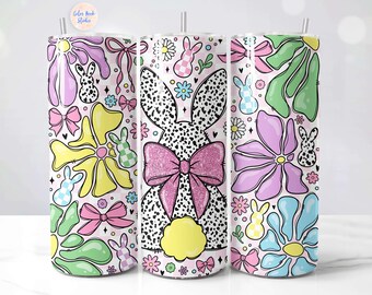 May include: Three 20 ounce stainless steel tumblers with a white background and colorful floral and bunny designs. The tumblers are perfect for spring and Easter.