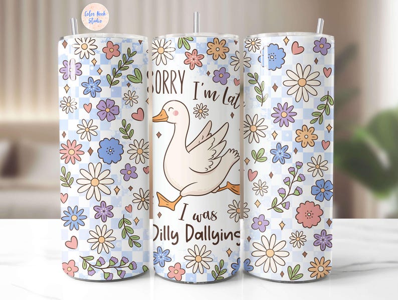 May include: A white tumbler with a floral pattern and a cute cartoon goose with the text "Sorry I'm Late I Was Dilly Dallying".