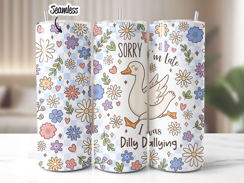 May include: A white tumbler with a floral pattern and a cartoon goose. The text on the tumbler reads "Sorry I'm Late I Was Dilly Dallying".