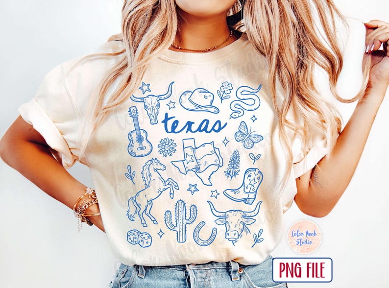 May include: Cream-colored t-shirt featuring blue illustrations of Texas symbols, including a guitar, longhorn skull, cowboy hat, and the word "Texas". The design also includes a horse, cactus, and Texas flag.